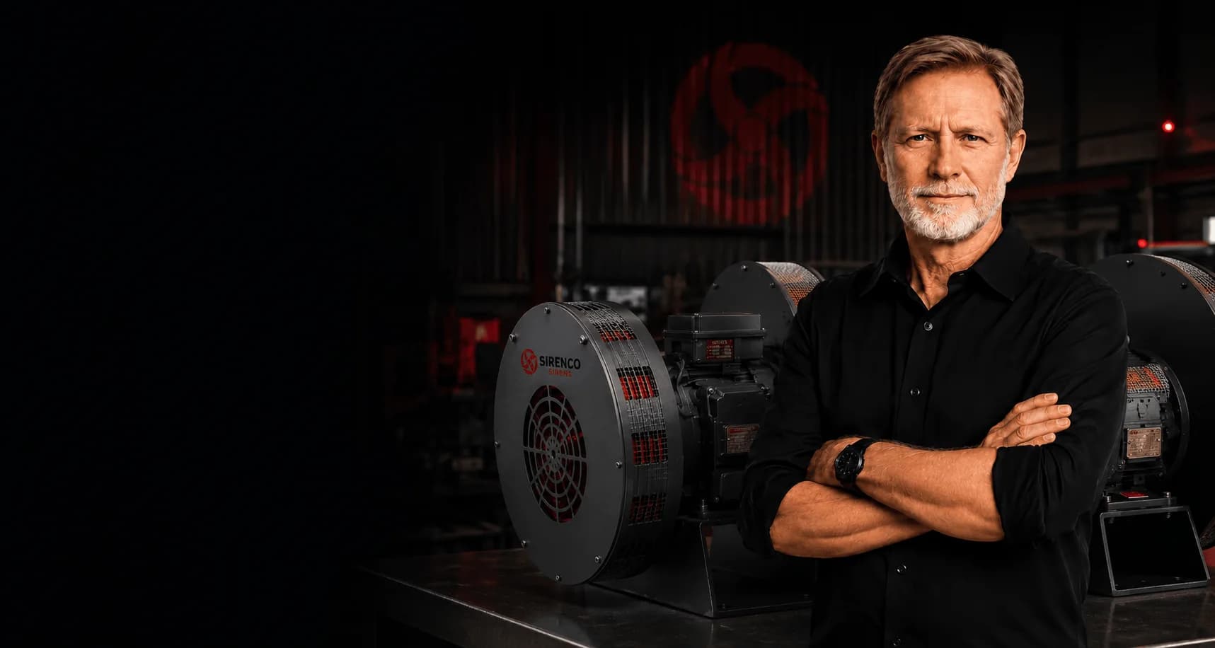 Neville McElroy with Sirenco mechanical warning sirens in the workshop